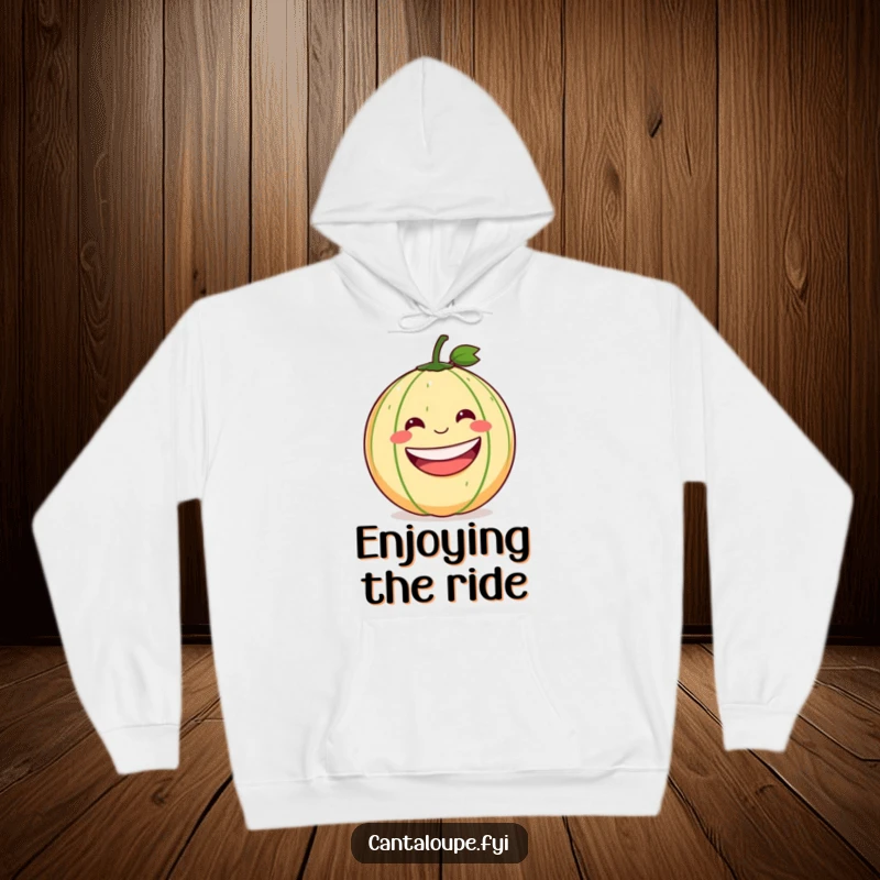 Funny Cantaloupe Hoodie: A round cantaloupe with a wide, happy grin is depicted rolling down a hill, ready for fun.