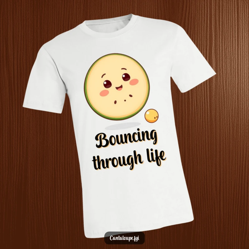 Funny T-Shirt with a happy cantaloupe slice character smiling and bouncing a small ball, embodying cheerful fruit playfulness.